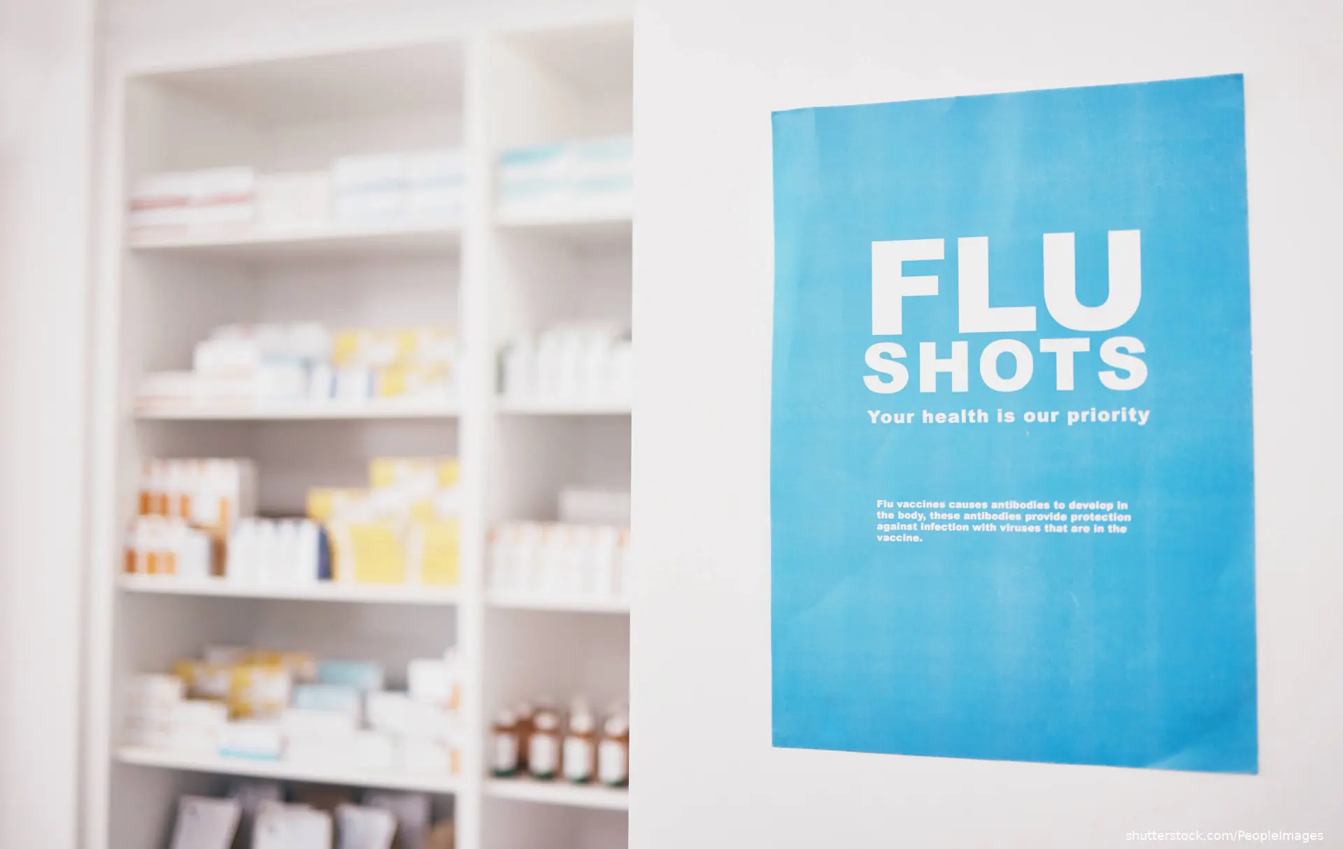 flu shot banner hanging in pharmacy