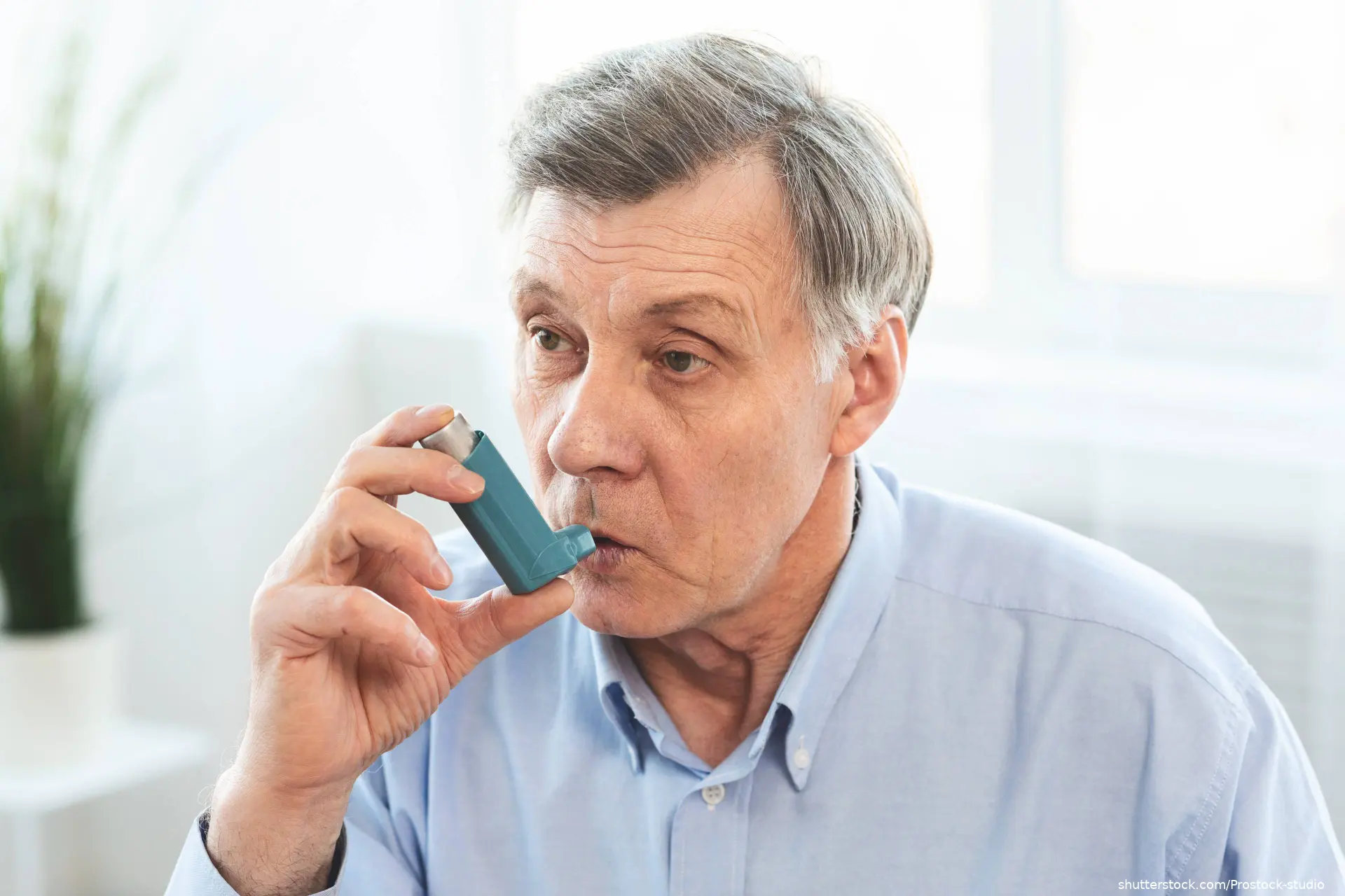 man using inhaler