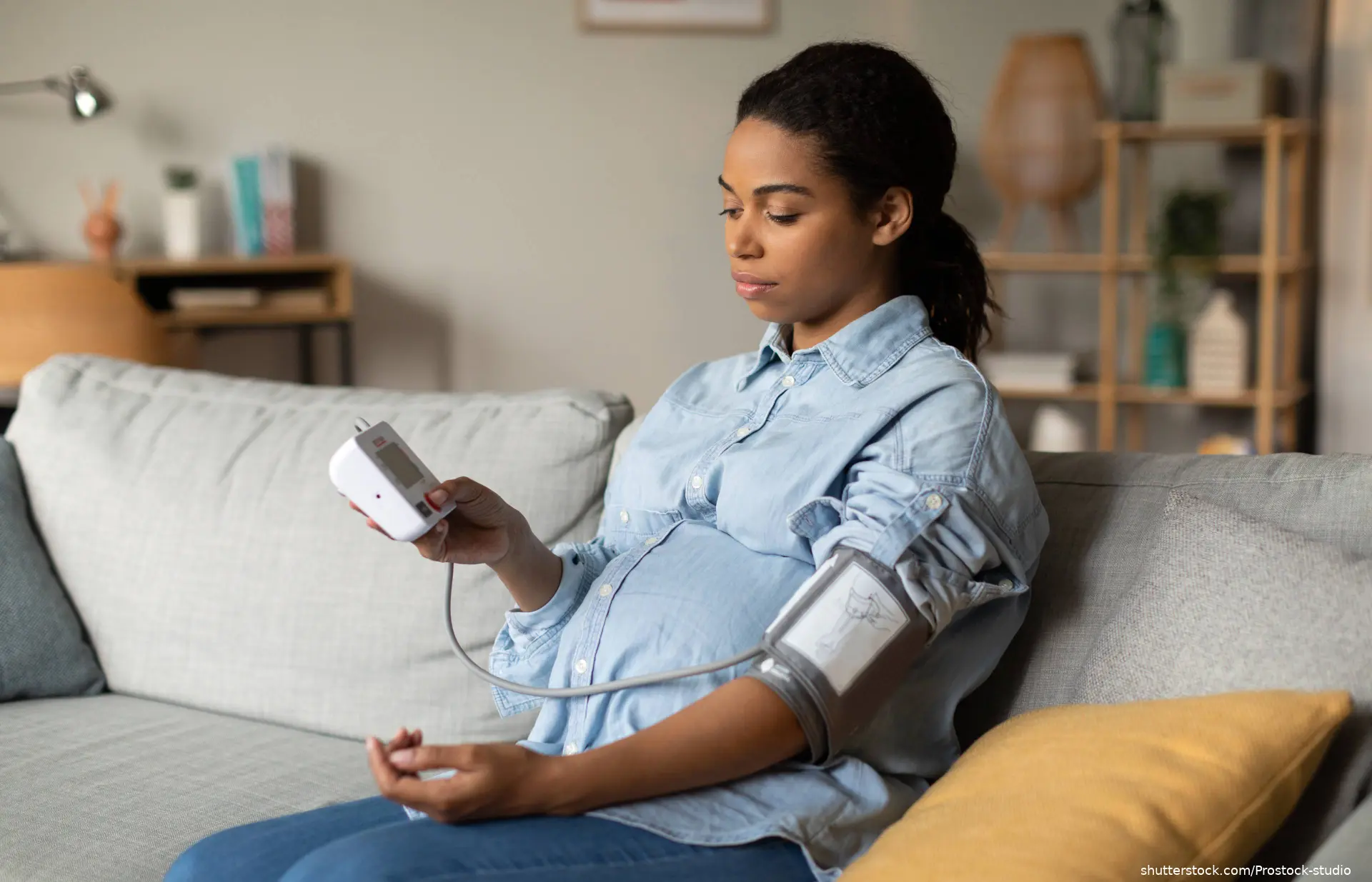 Pregnant African American Lady Measuring Blood Pressure