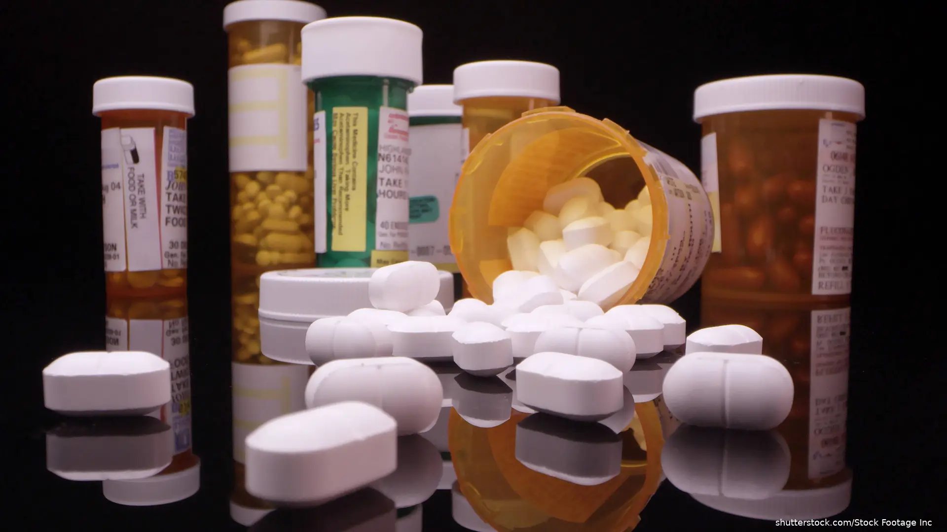 pill bottles and pills spilling out