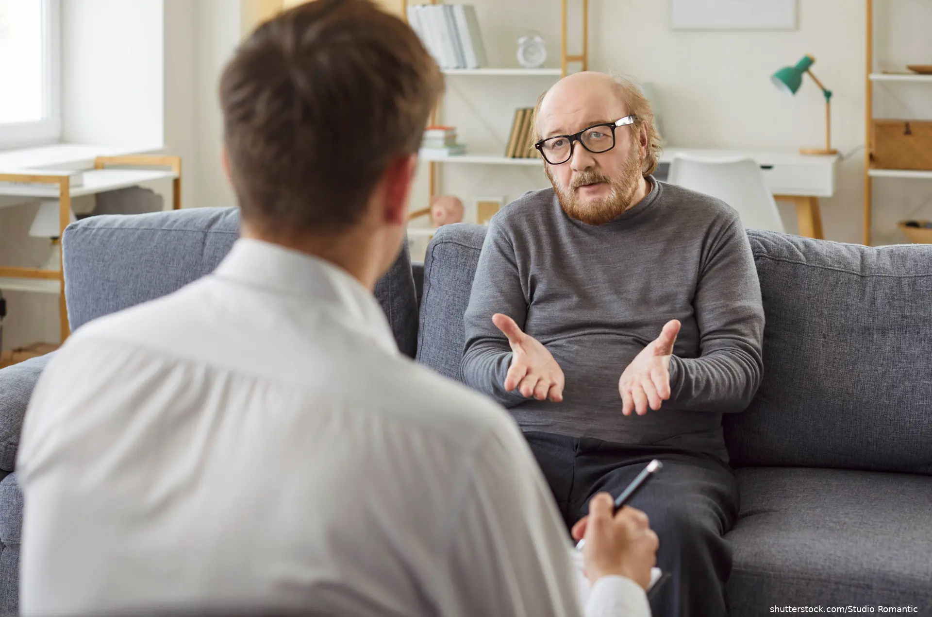 psychiatrist couseling elderly man