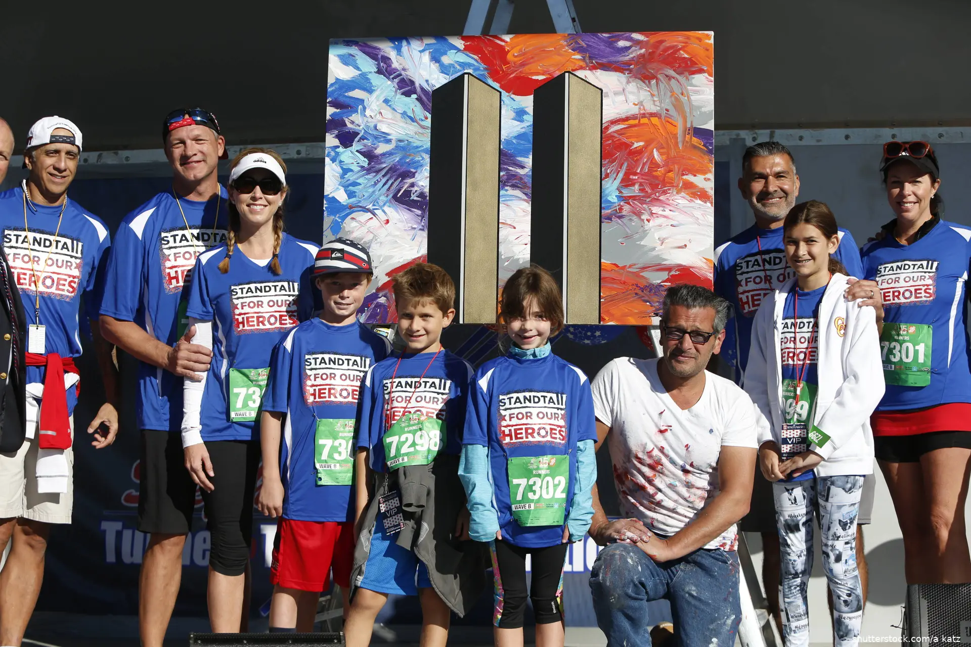 children standing in front of a world trade center painting