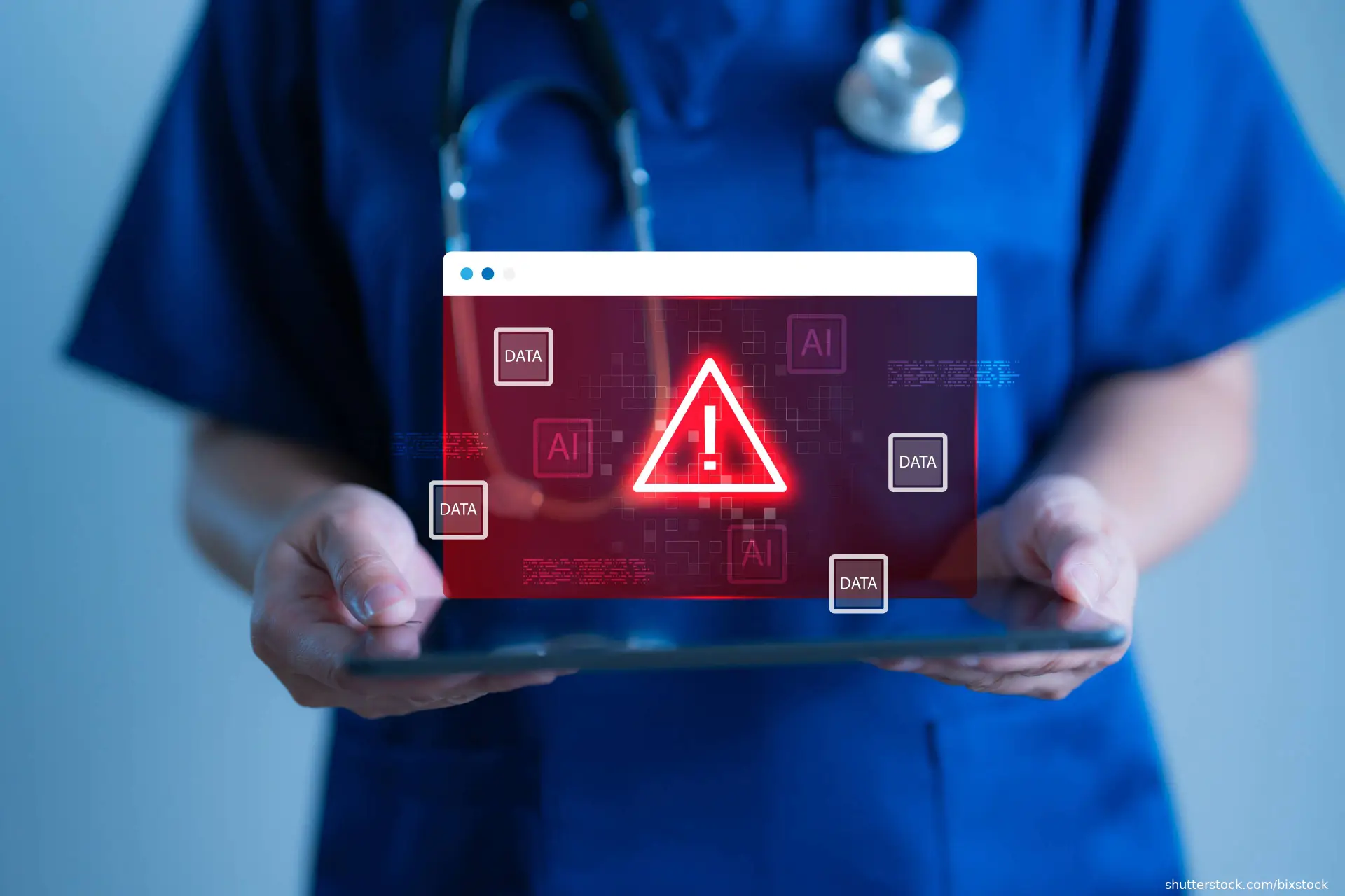 Doctor holding tablet with red warning alert