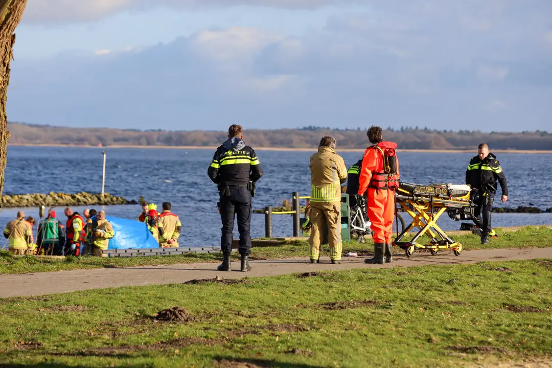 Persoon in water Naarden