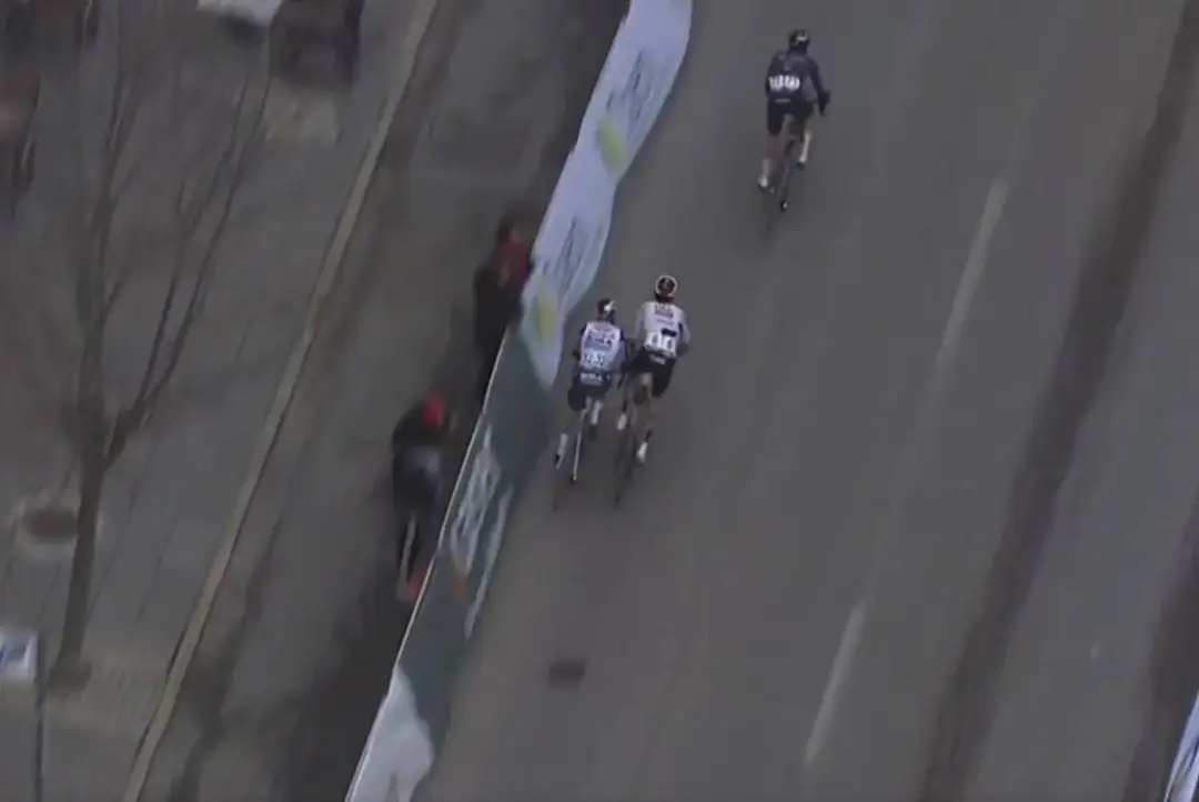 Jan Christen pushes Maxim van Gils into the barriers at the 2026 Clasica Jaen Paraiso Interior