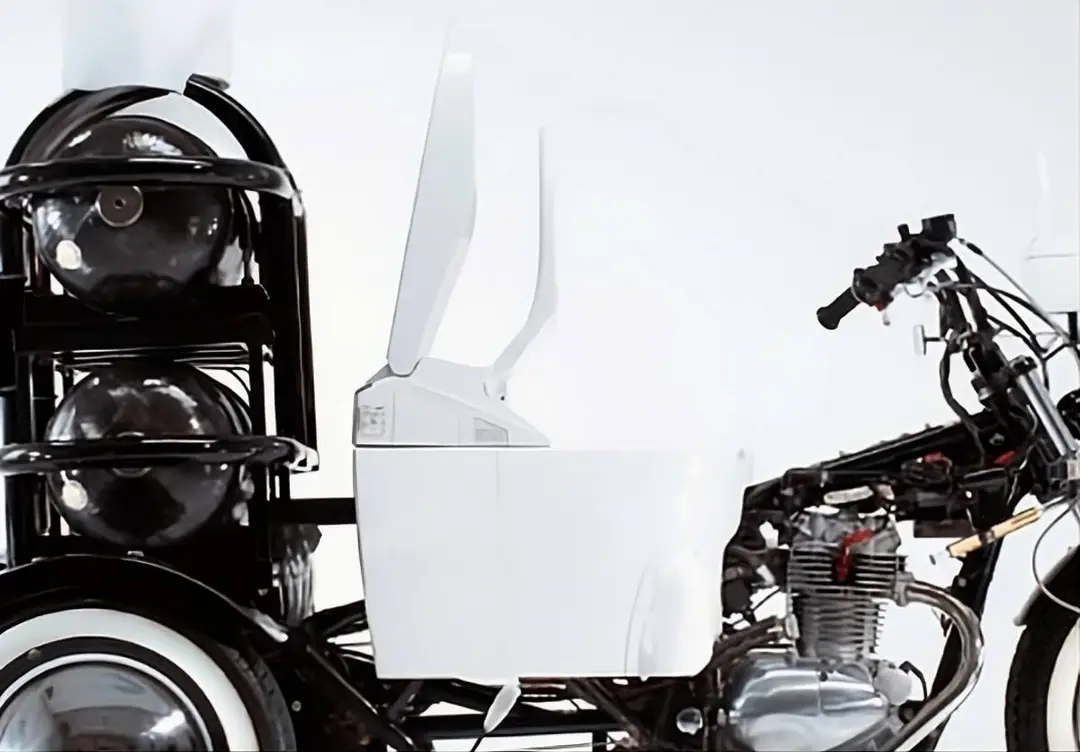 Toilet Bike Neo three-wheeler with toilet seat, created by TOTO in 2011 for an environmental campaign