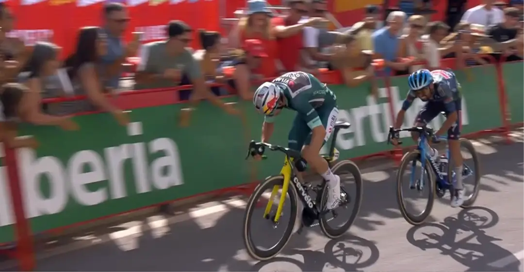 Wout van Aert and Valentin Paret-Peintre launch their final sprint to decide the winner of stage 13.