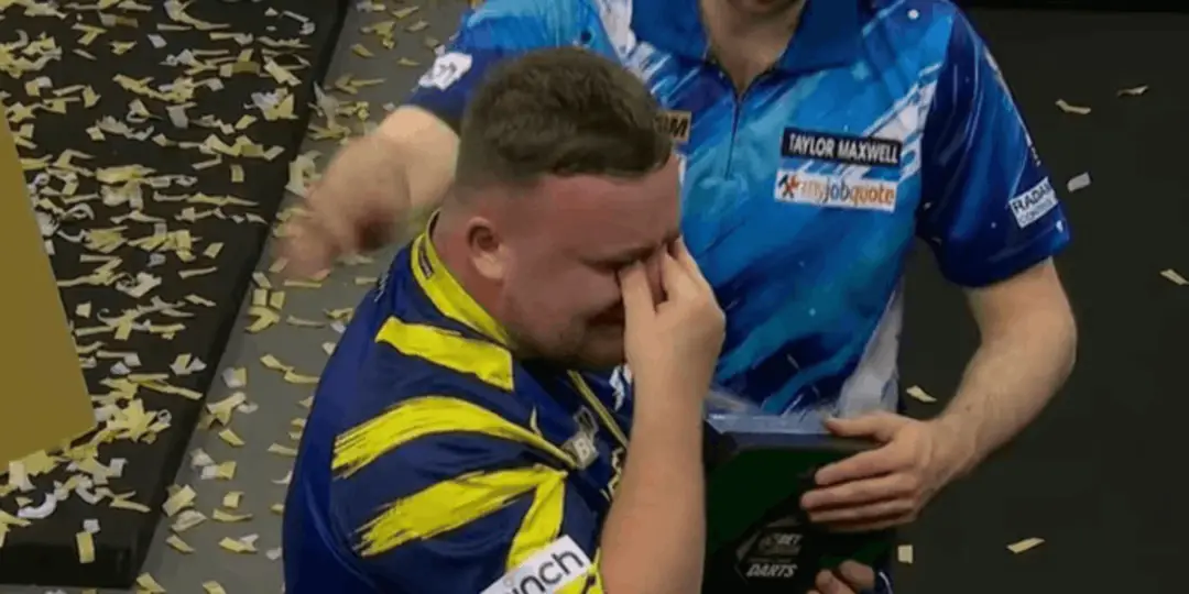 Luke Littler consoled by Luke Humphries after breaking down in tears during his post-match interview