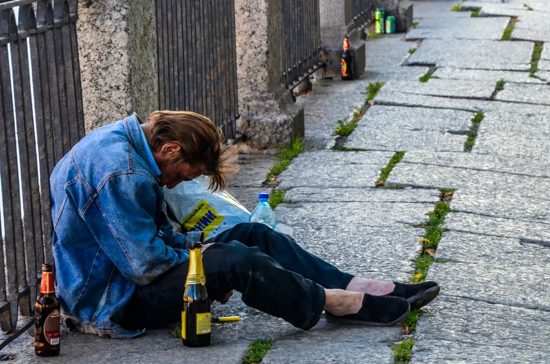 drunk man in saint petersburg2c russia during the white nights in summer2c people love to drink and to party some then need an early break 283286654502229