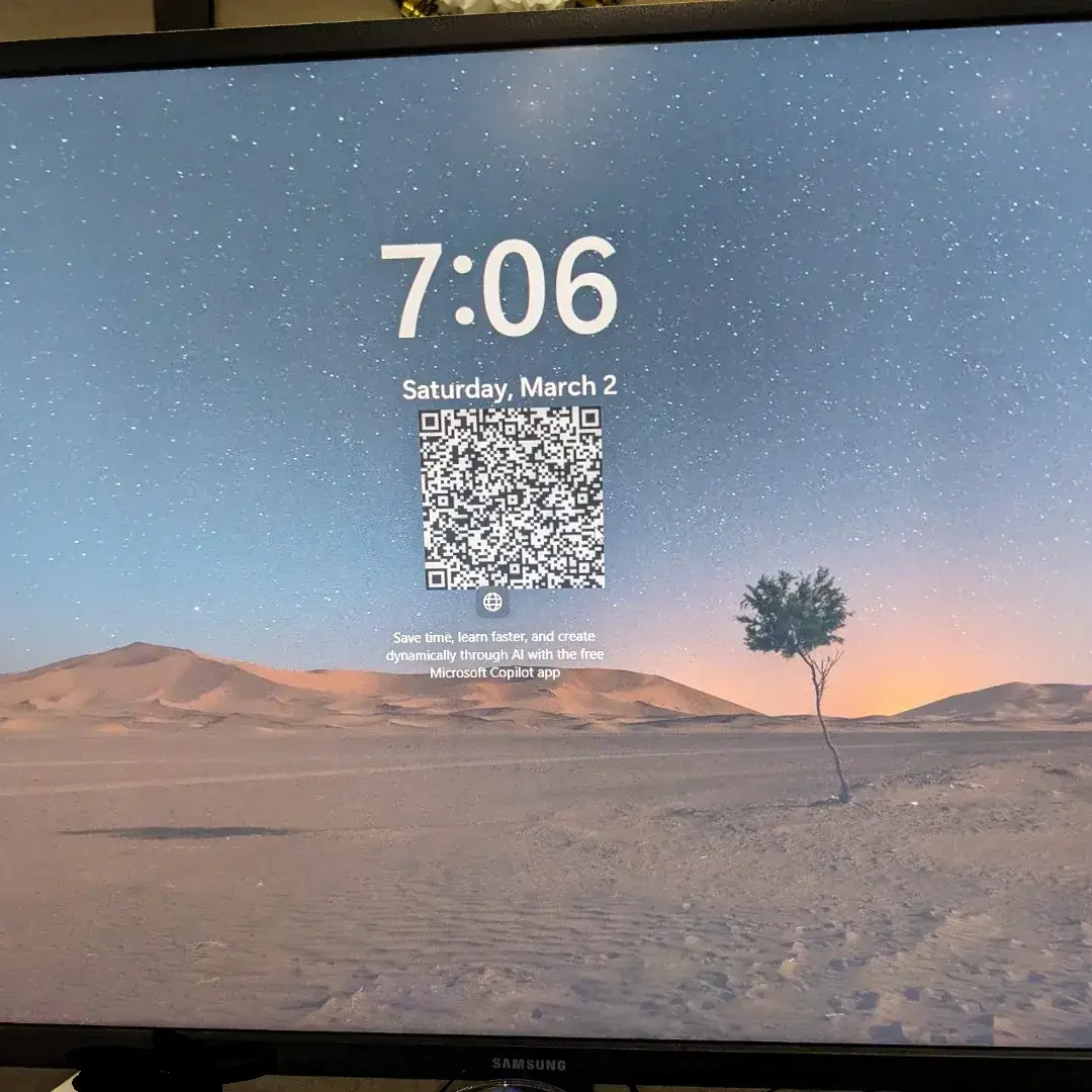 so were putting qr code ads for copilot in our wallpapers v0 5sb6quvxr0mc1