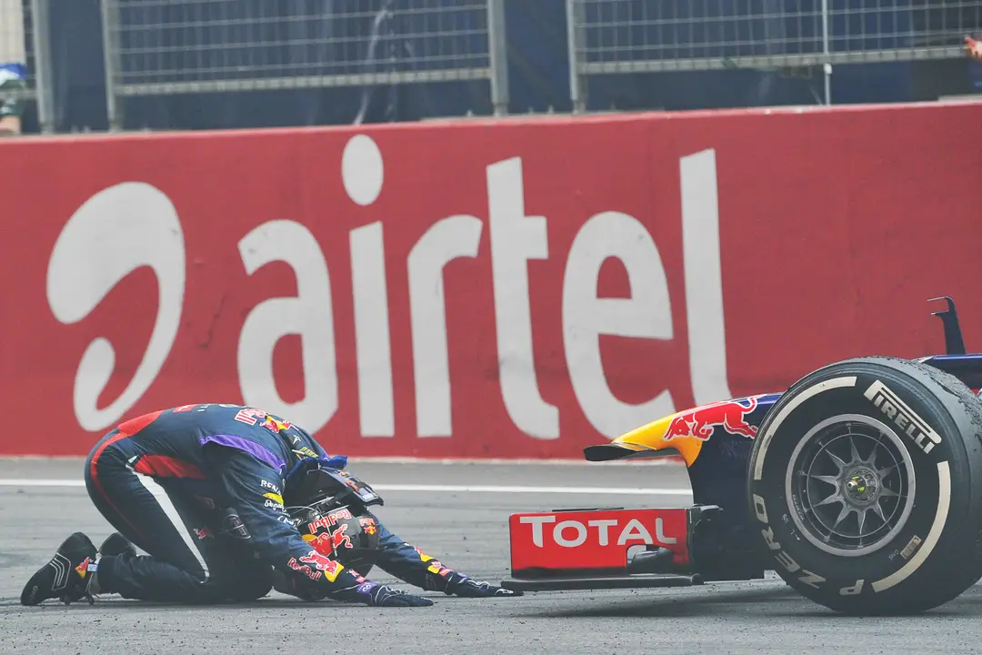 Vettel celebrating his record-breaking championship in 2013 at the Indian Grand Prix, which saw him set a then-record for most consecutive race wins.