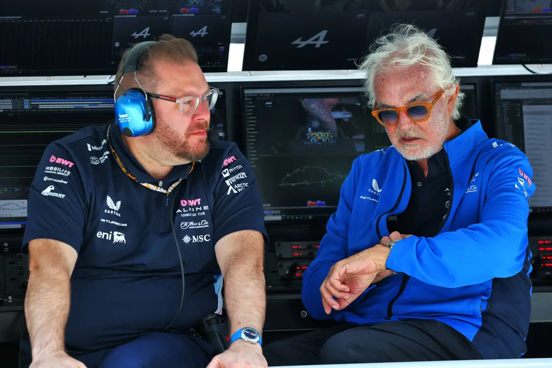 Flavio Briatore looking at his watch