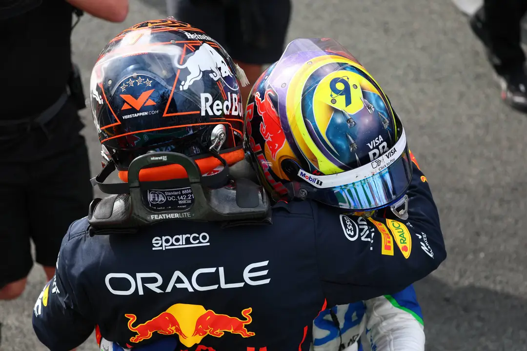 Isack Hadjar and Max Verstappen hugging after the 2025 Dutch Grand Prix