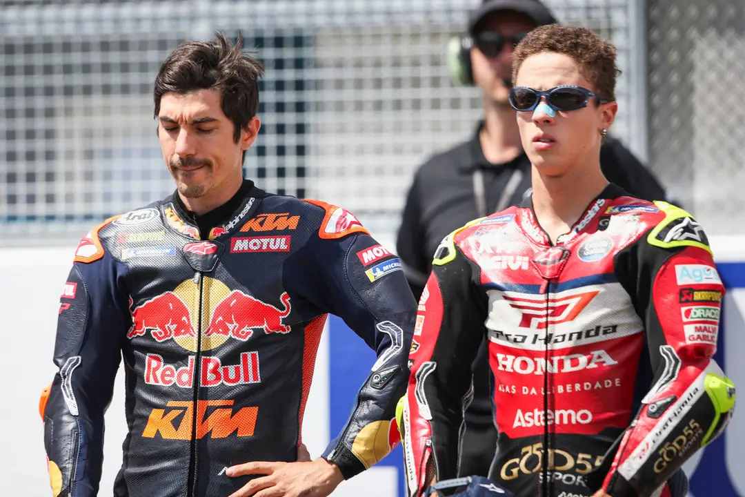 Maverick Vinales stands with Diogo Moreira