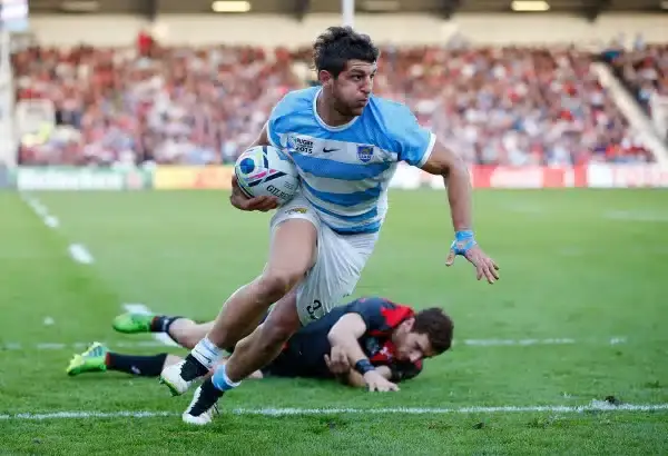 GLOUCESTER, ENGLAND - SEPTEMBER 25: Tomas Cubelli of Argentina is tackled by Vasil Lobzhanidze of Georgia on the way to scoring his teams second try during the 2015 Rugby World Cup Pool C match between Argentina and Georgia at Kingsholm Stadium on Septemb