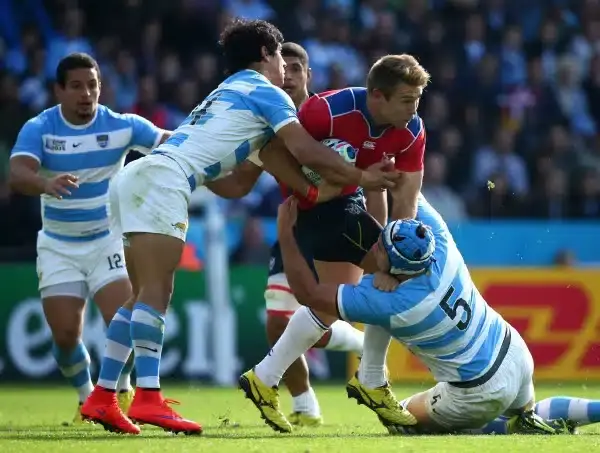 LEICESTER, ENGLAND - OCTOBER 11 : Johan Deysel of Namibia is tackles by Matias Alemanno and Matias Moroni of Argentina during the 2015 Rugby World Cup Pool C match between Argentina and Namibia at Leicester City Stadium on October 11, 2015 in Leicester, U