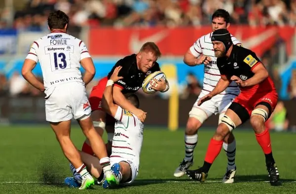 BARNET, ENGLAND - OCTOBER 31: Jackson Wray of Saracens is tackled by Fergus Mulchrone of London Irish during the Aviva Premiership match between Saracens and London Irish at Allianz Park stadium on October 31, 2015 in Barnet, England. (Photo by Stephen Po
