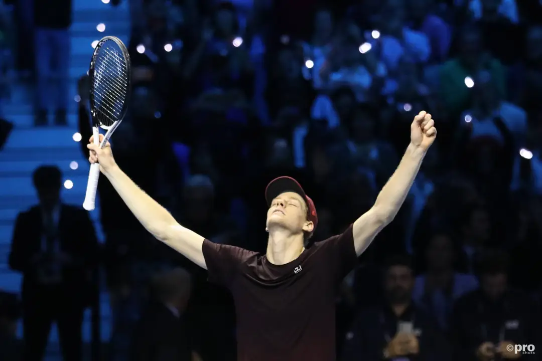 Jannik Sinner celebrates ATP Finals win.