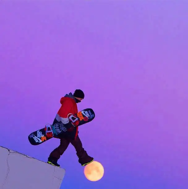 snowboarder walking on moon perfect timing