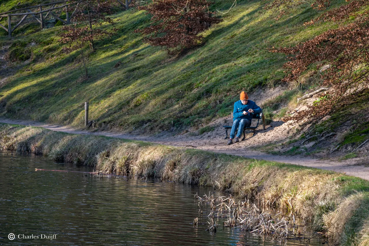 man op bank