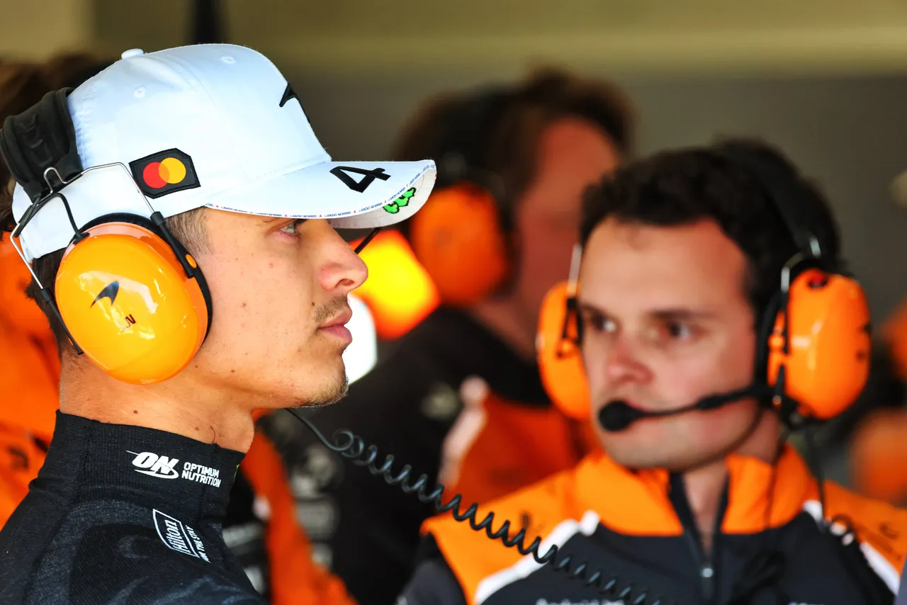 lando norris in the mclaren garage at silverstone