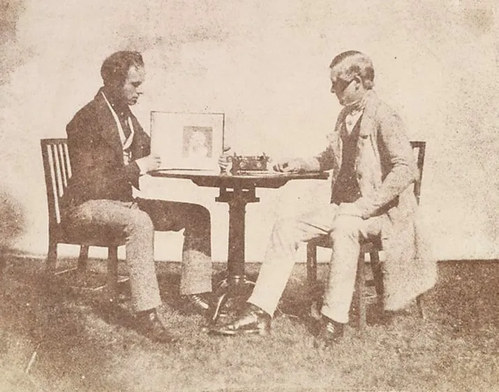 nicolaas henneman showing an album to charles porter