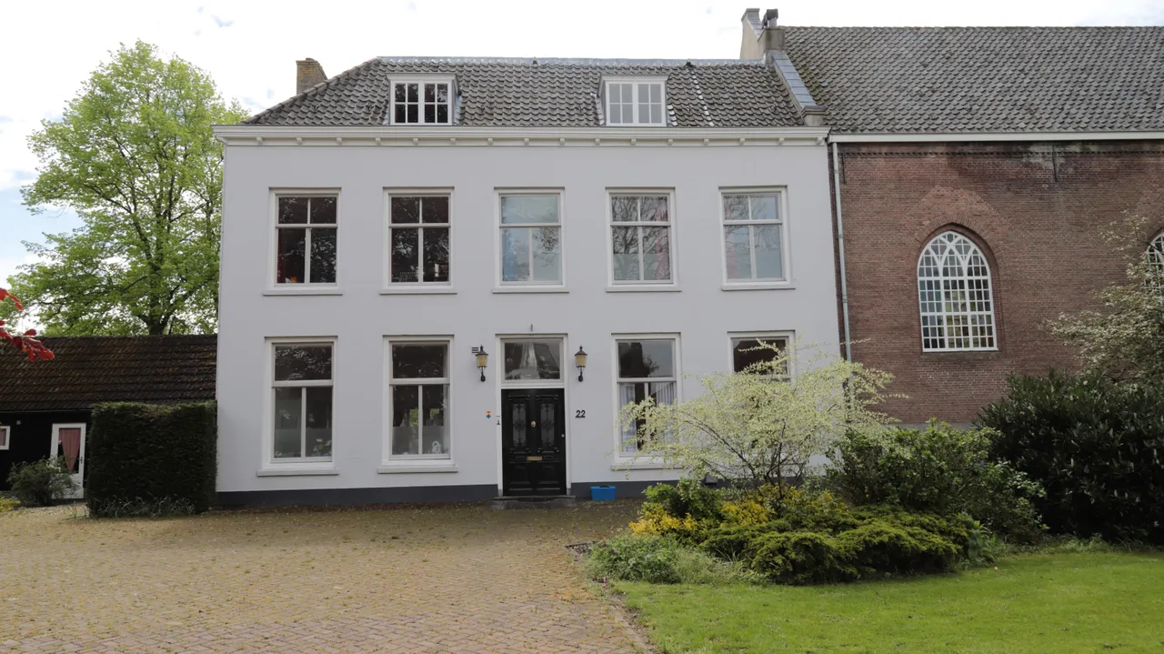 Het “Huis der Zuchten”, de predikantenwoning van de NH-kerk