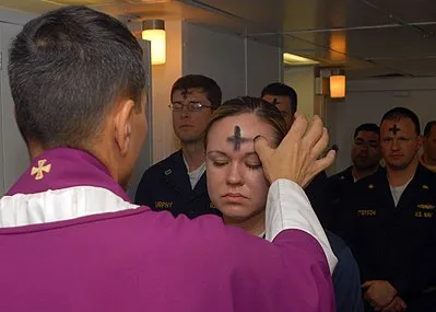 ash wednesdaywikipedia399px us navy 080206 n 7869m 057 electronics technician 3rd class leila tardieu receives the sacramental ashes during an ash wednesday celebration