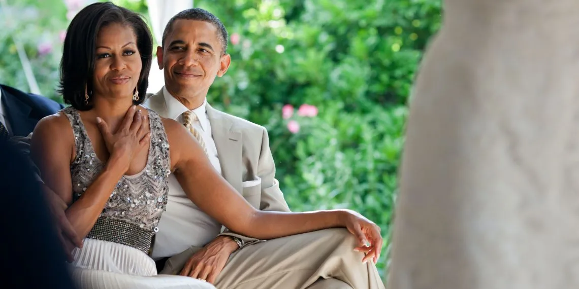 barack and michelle obama watching a wedding 1140x570