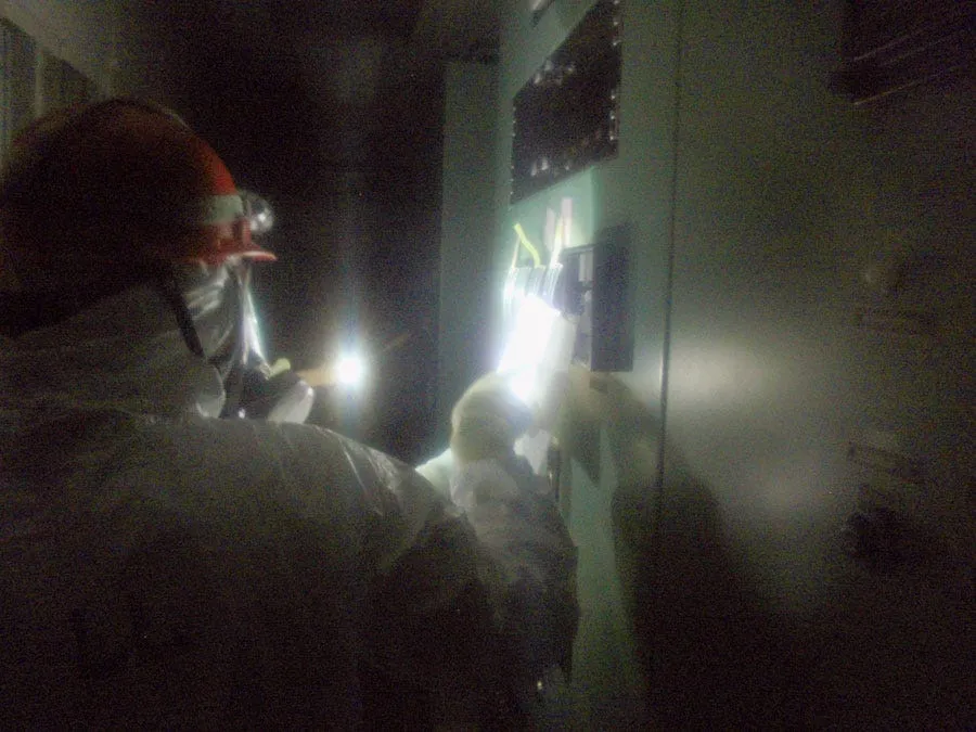 when they take a break the workers rest and eat in a small decontaminated room