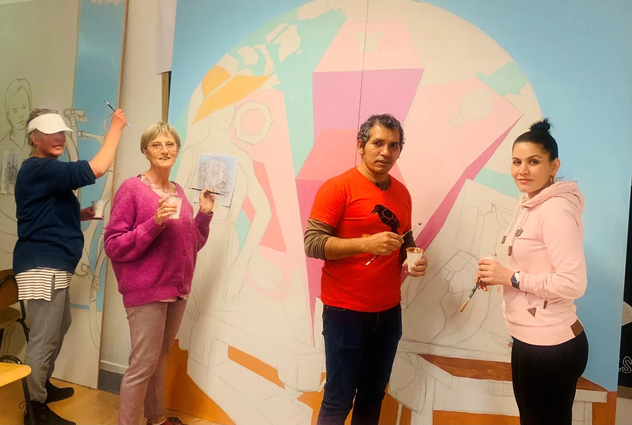 samenwerken aan een muurschildering over duurzaamheid foto stichting piezo