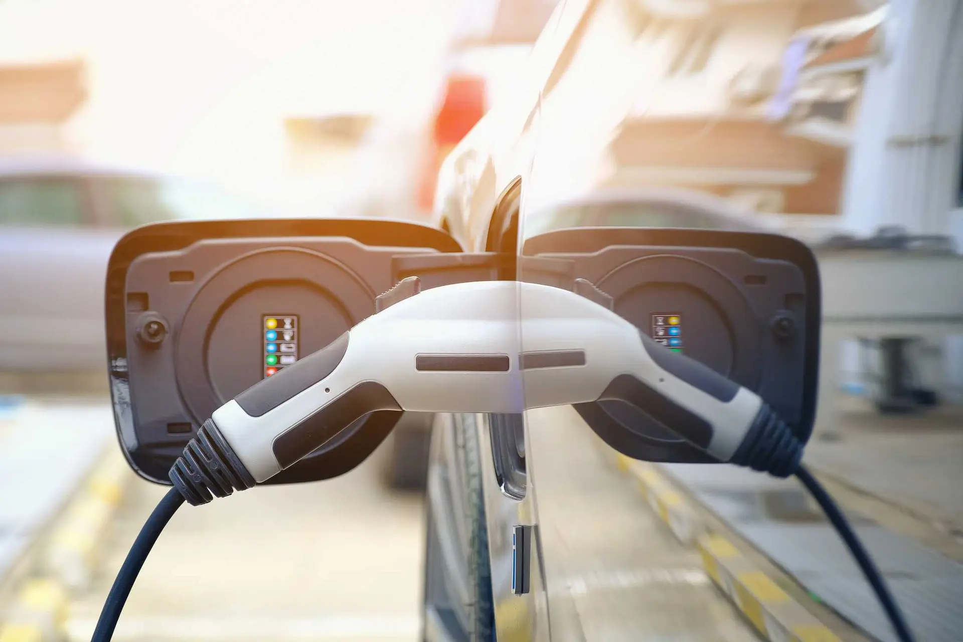 charging modern electric car battery on the street heq9aja