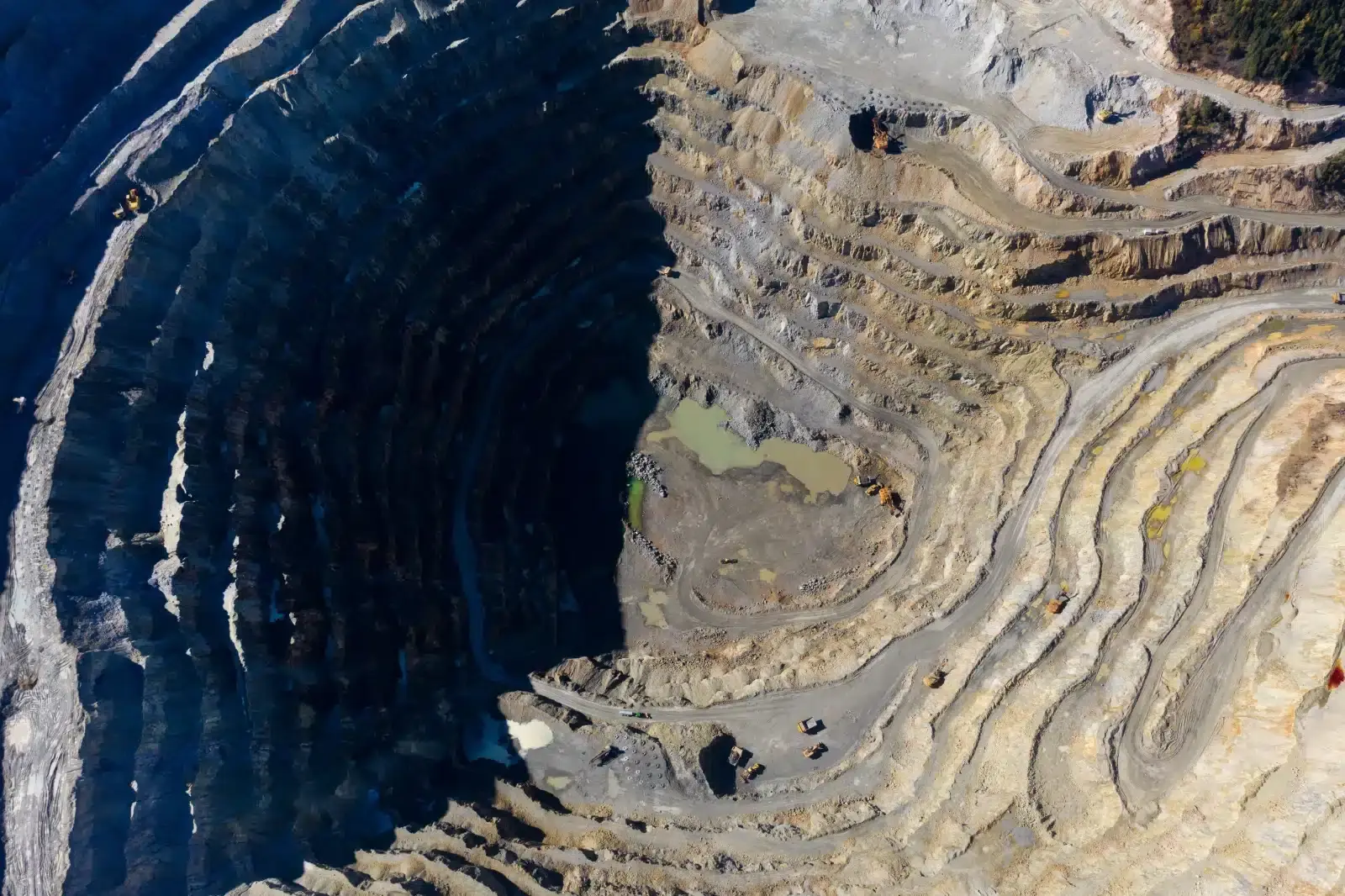 flying above an open pit mine copper excavation i 2023 11 27 05 14 50 utc