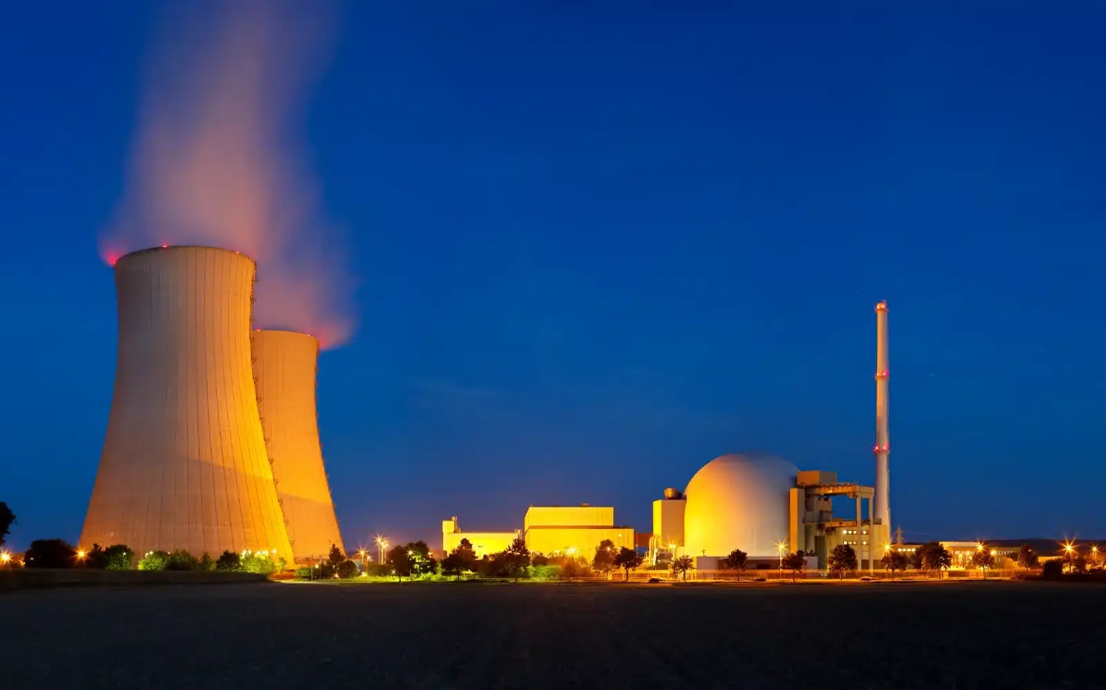 nuclear power station with night blue sky 2023 11 27 05 08 27 utc