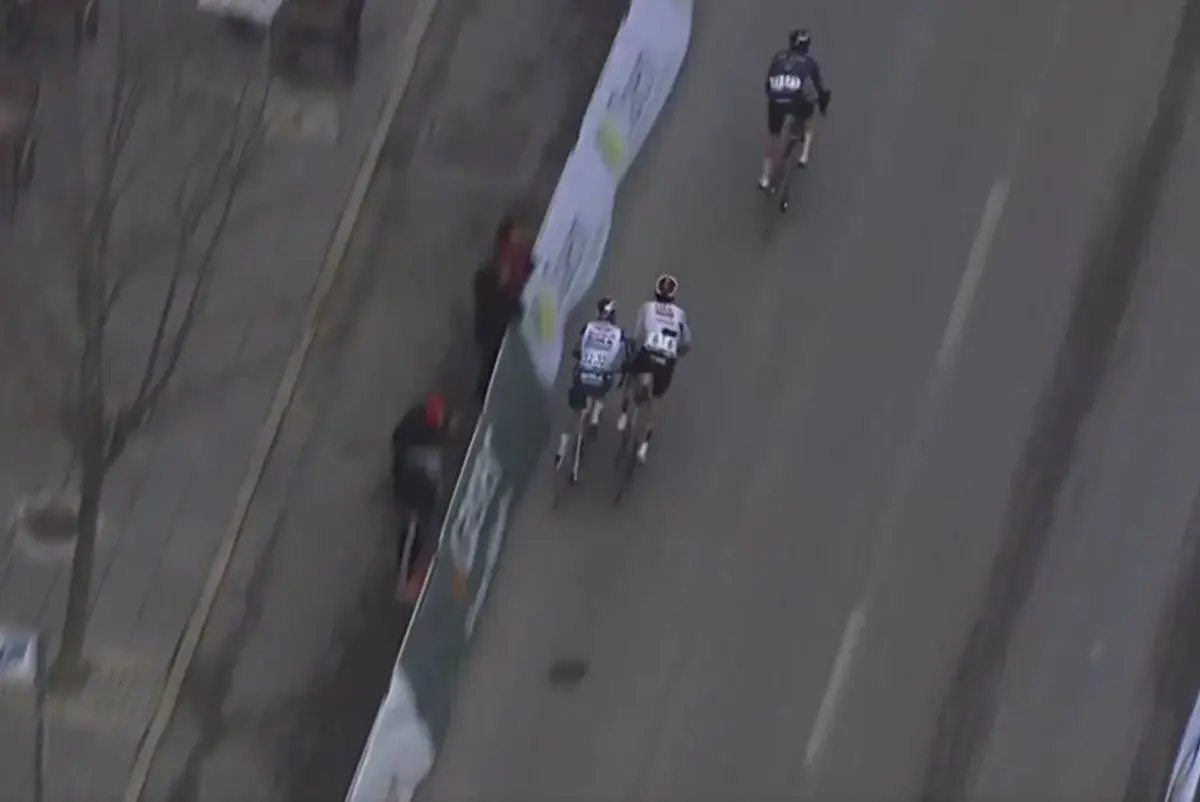 Jan Christen pushes Maxim van Gils into the barriers at the 2026 Clasica Jaen Paraiso Interior