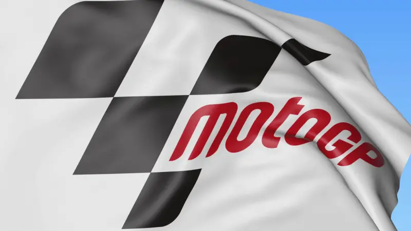 close up of waving flag with motogp logo seamless loop blue background editorial animation 4k he88iepwg thumbnail full01 e1542369785773