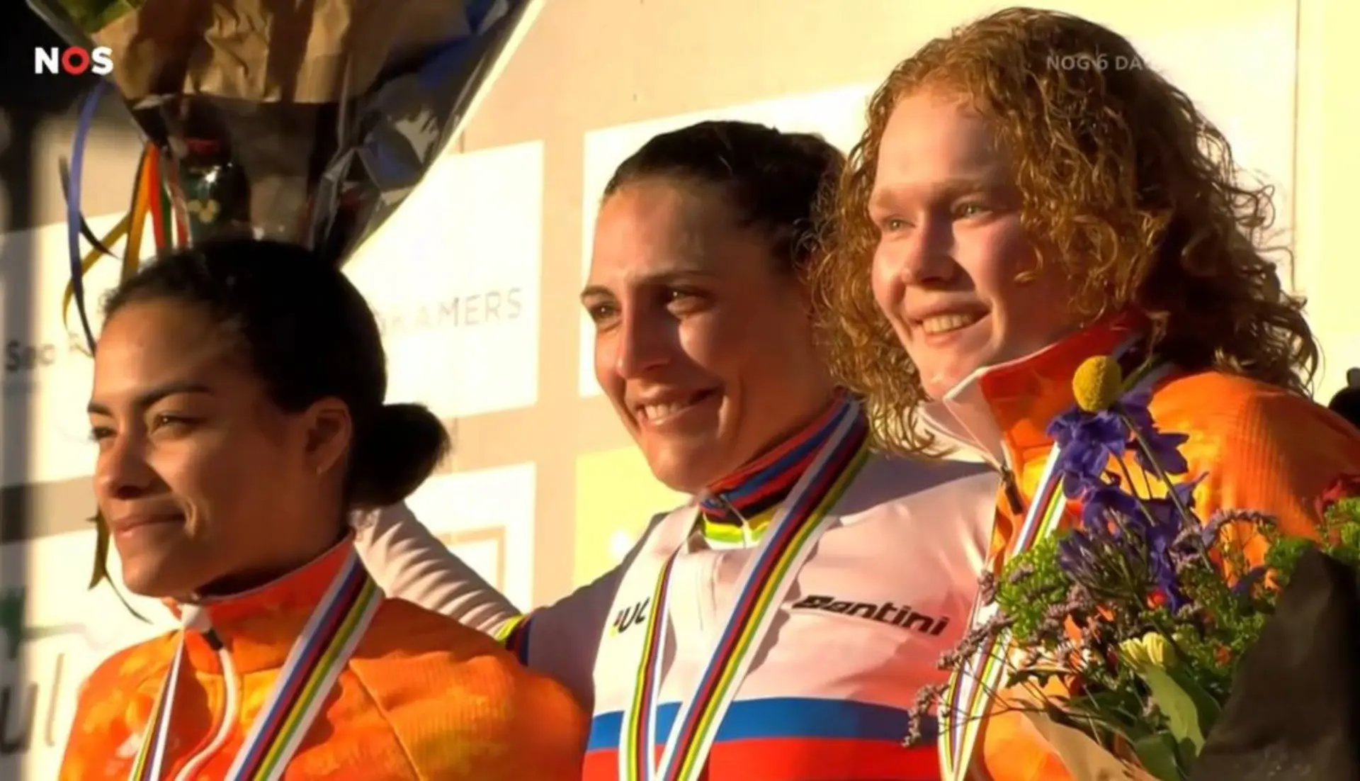 Ceylin del Carmen Alvarado, Lucinda Brand and Puck Pieterse stand on the podium after the 2026 Cyclocross World Championships
