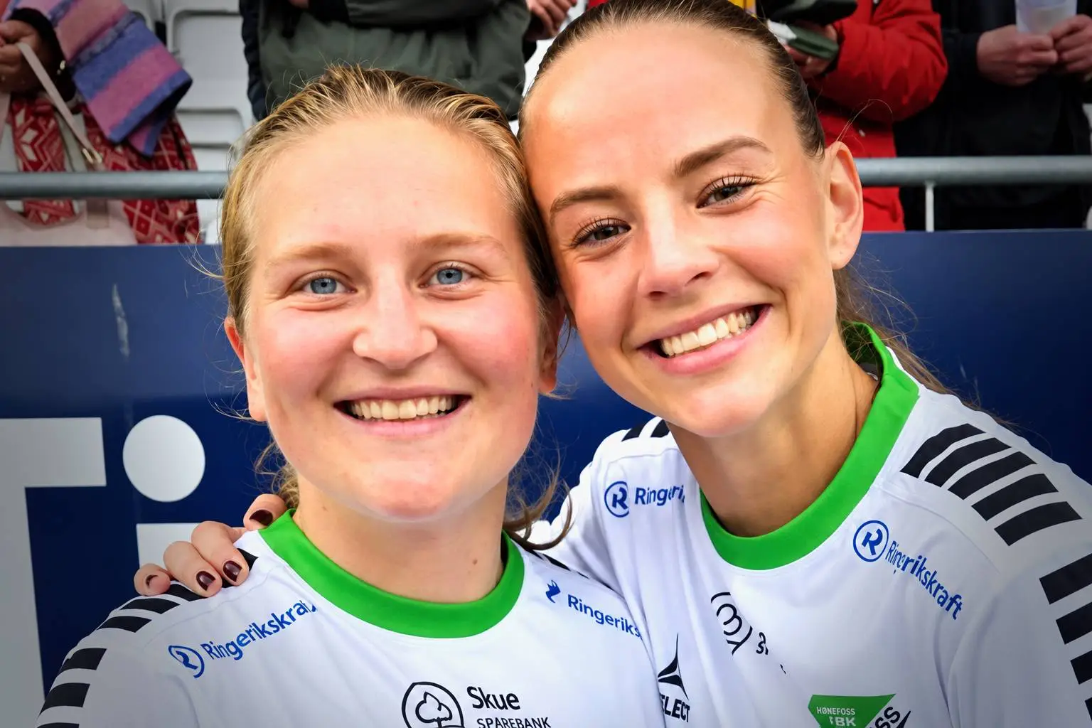 Lagvenninner i sportsarenaen