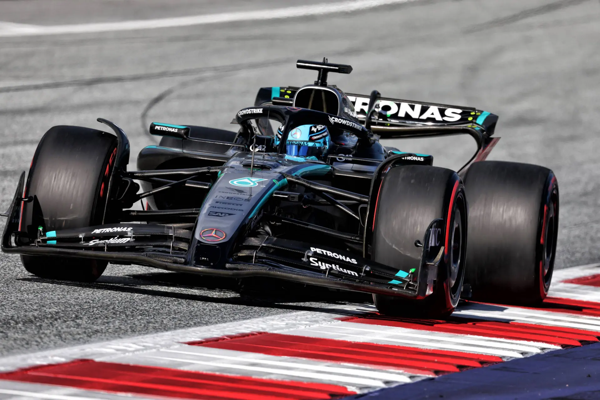 George Russell driving the W16 at the Austrian Grand Prix