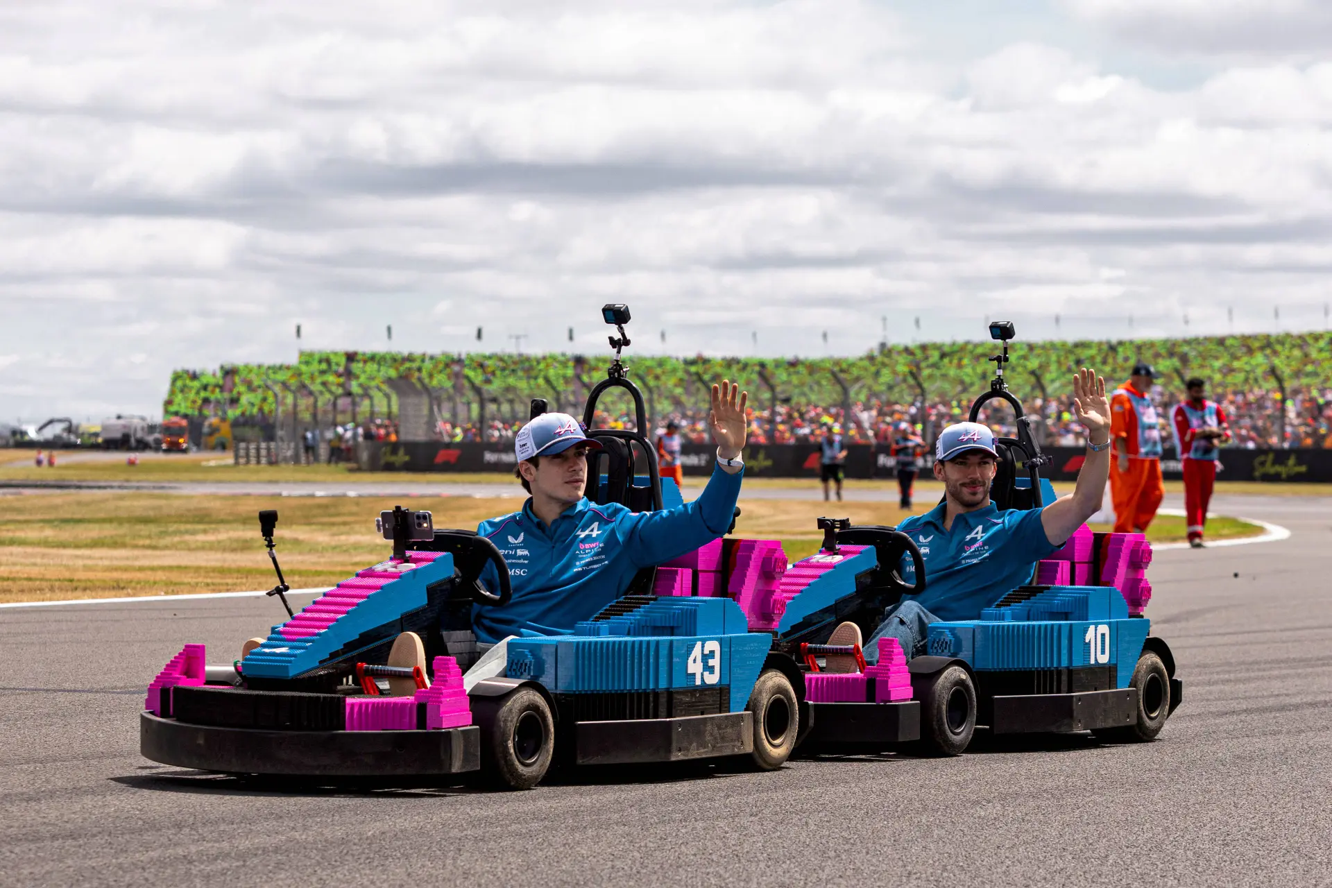Franco Colapinto and Pierre Gasly take the Silverstone parada lap