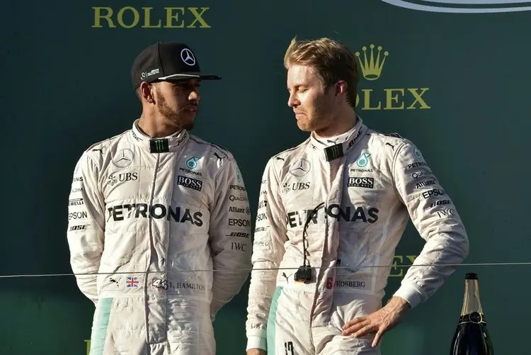 mercedes amg petronas f1 teams german driver nico rosberg r talks to his teammate british driver lewis hamilton3