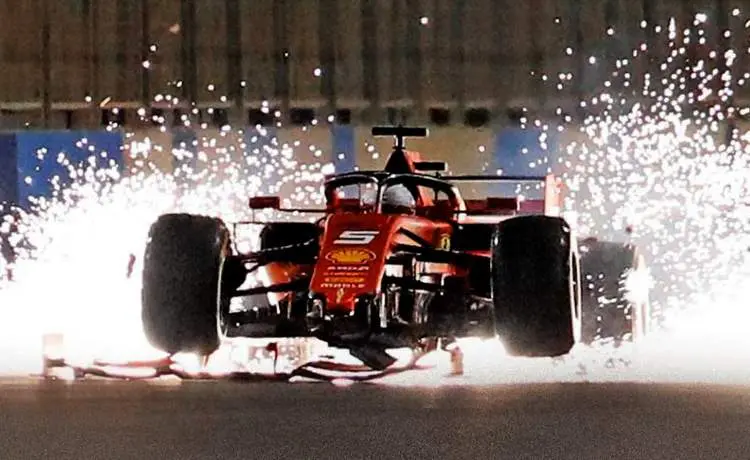vettel crash screengrab sparks fly f1 ferrari bahrain photo