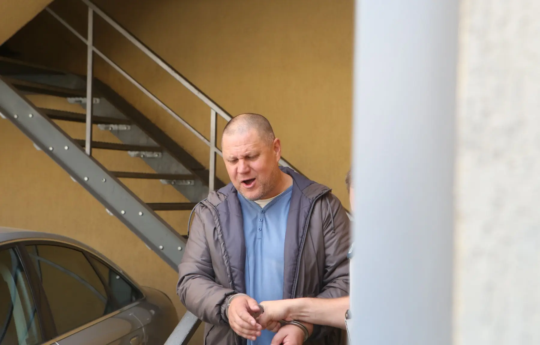 A. Ulvydas išvedamas iš teismo