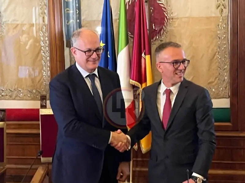 gualtieri berardi stretta di mano