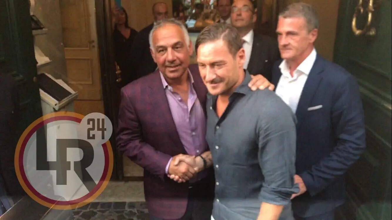 pallotta totti stretta mano