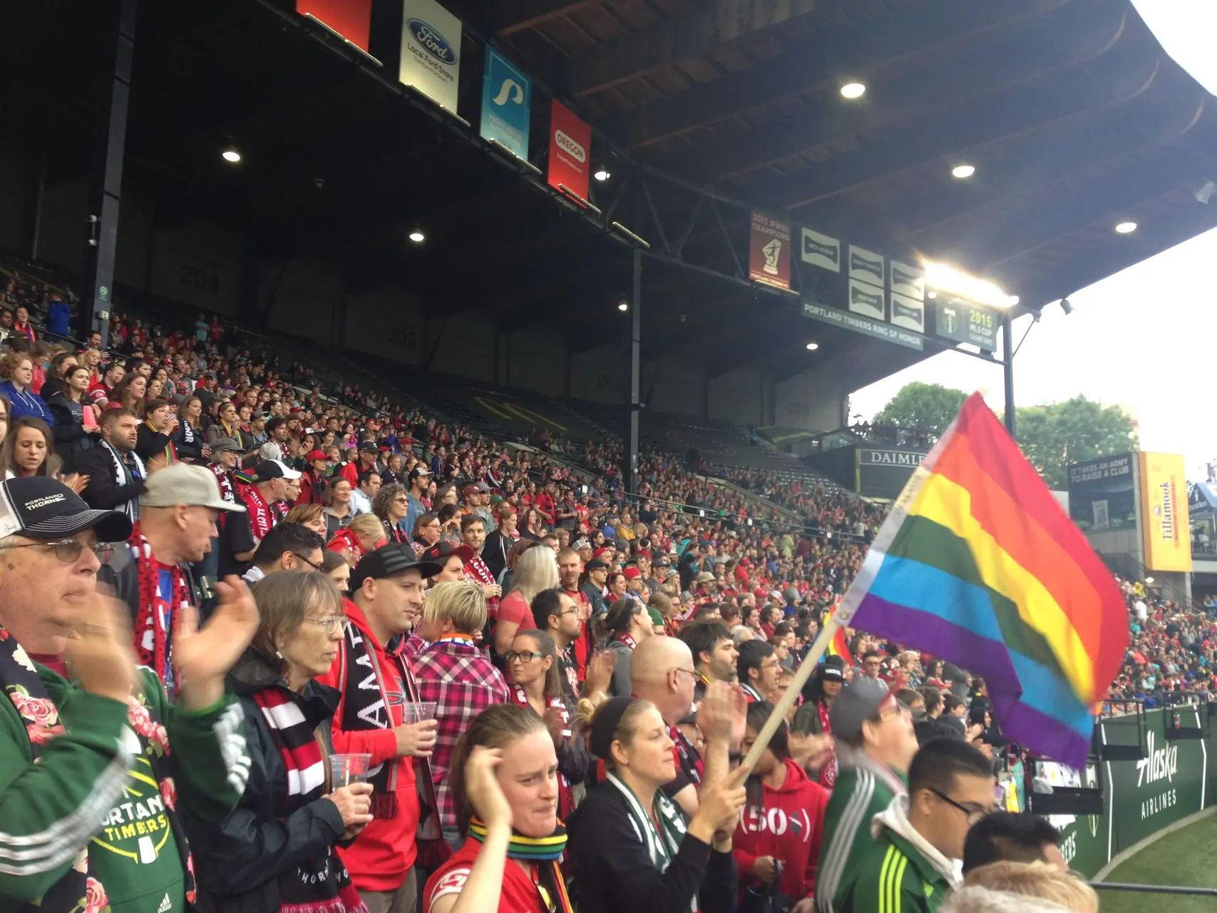 lgbt rainbow pride flag at professional soccer game