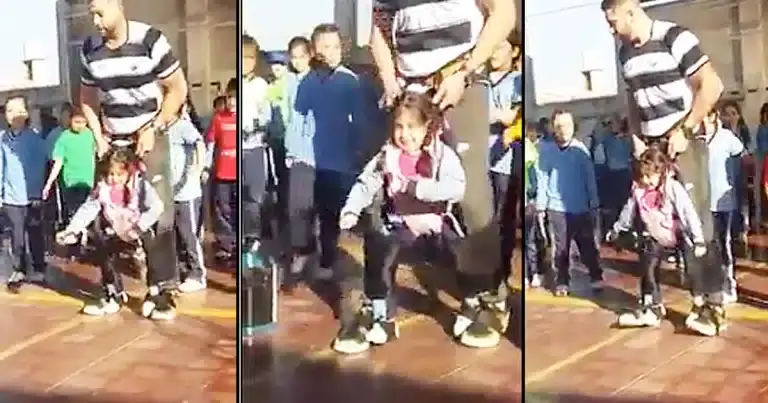 godvine pe teacher helps student with disability dance