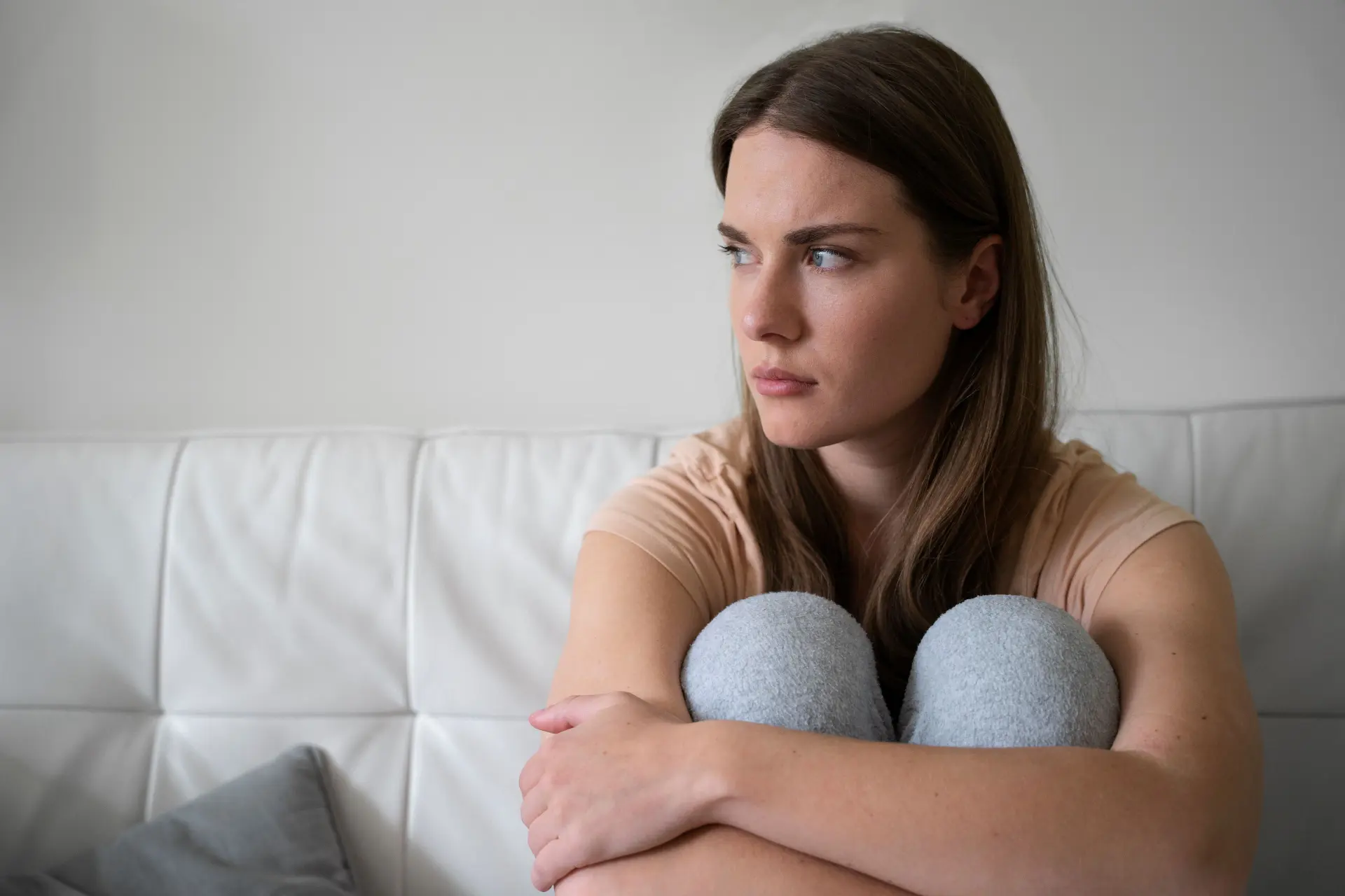 front view anxious woman couch