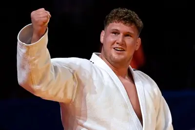 netherlands jur spijkers celebrates defeating germany s johannes frey in the men s over 100 kg gold medal bout of the european judo championships 2022 at the armeets arena in sofia on may 1 2022 photo by nikolay doychinov afp