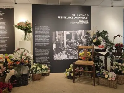 bezoekers kunnen in een foto stappen waar kabel tussen de bloemen staat